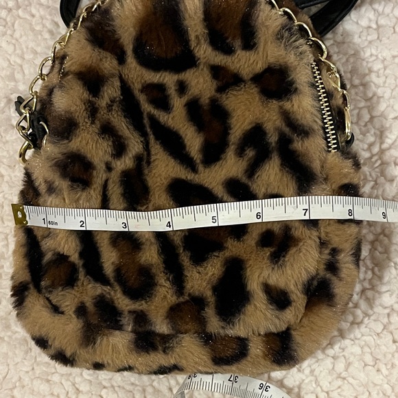 Leopard print faux fur mini backpack/ crossbody purse. Gold-tone hardware. - Picture 12 of 14